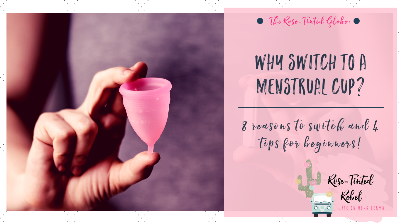 woman holding pink menstrual cup in hand
